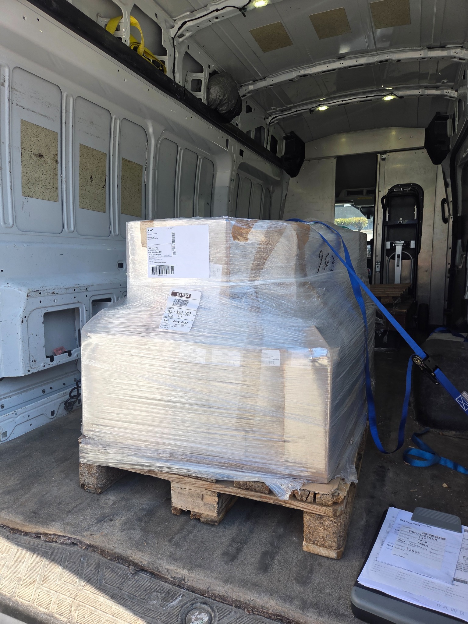 Wrapped pallet secured inside Goldmark cargo van